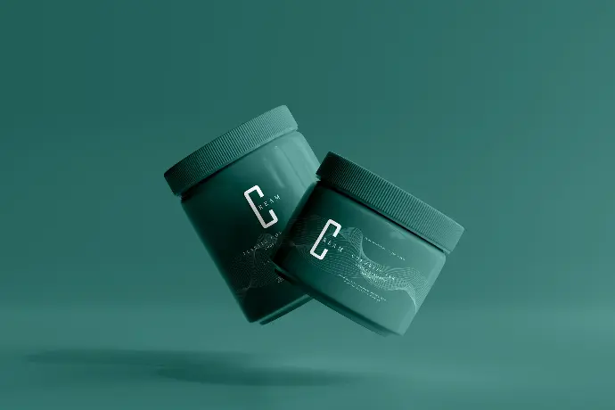 a green container with the letter c on it flying through the air